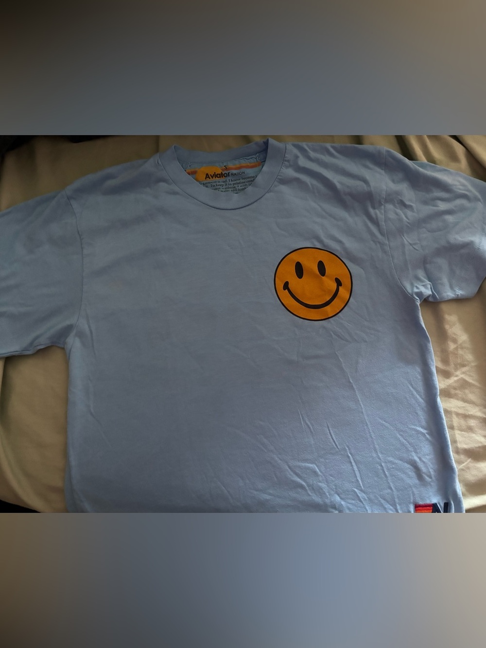 Aviator Nation Light Blue Tee with Orange Smiley Chest